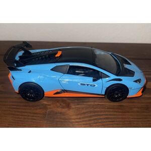 LAMBORGHINI HURACAN STO BLUE 1/24 DIECAST CAR SHOWCASTS 68279D